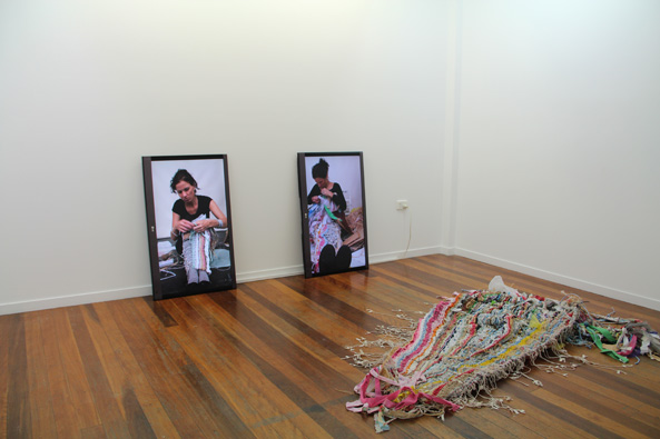 Rebecca Kinsey, Labour, 2013-14. Installation view. digital videos and woven object